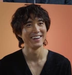 Justin H. Min photo 4